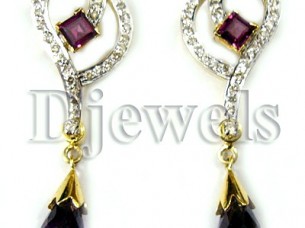 14 k Garnet Studded Gold Diamond Earrings..